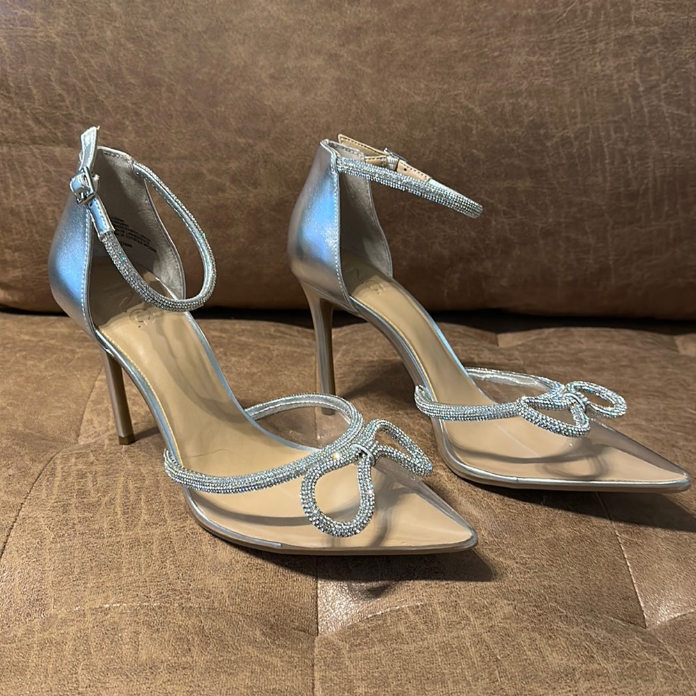 Women's INC Lidani Pointed-Toe Clear Vinyl and Silver Pumps with bows. Size 10